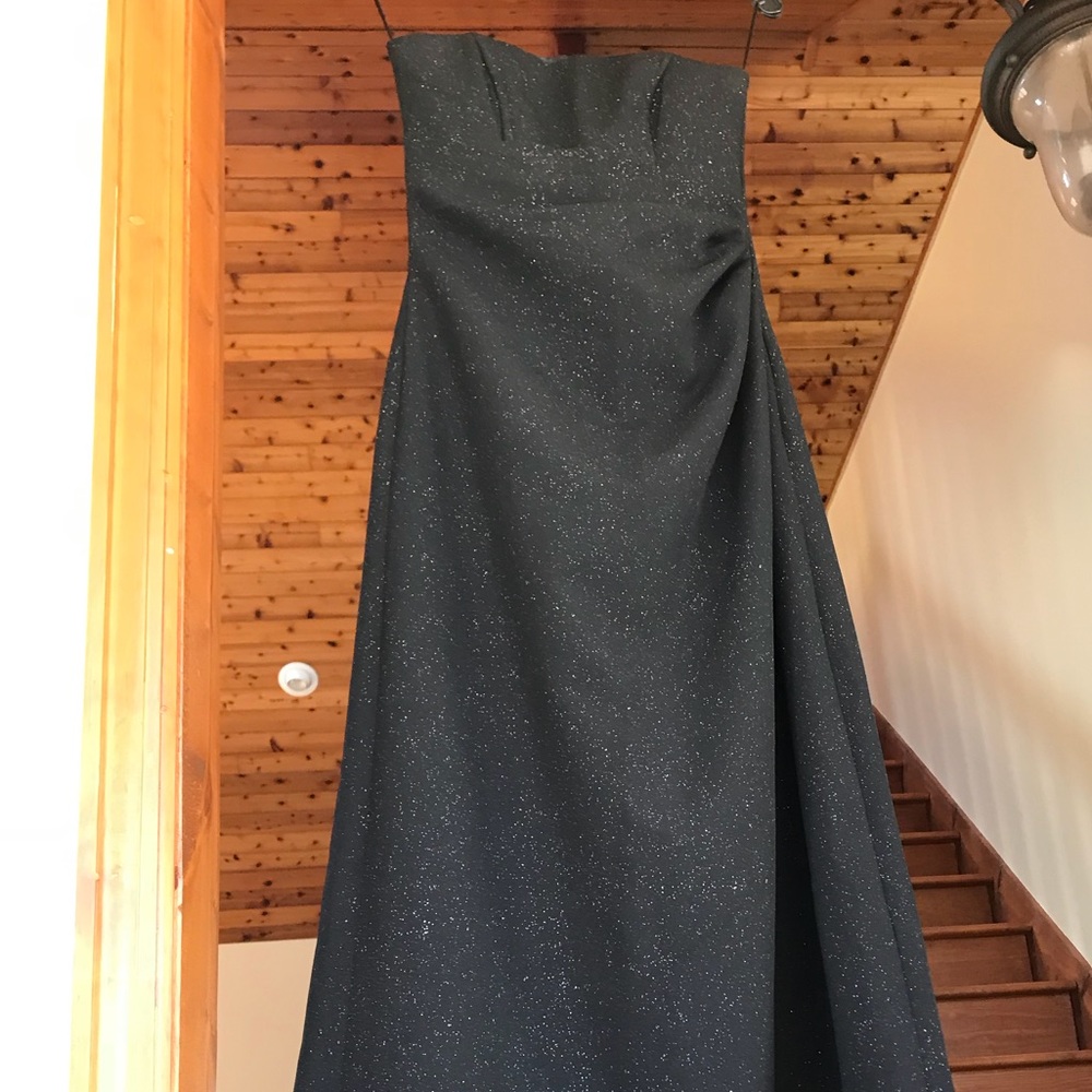 Black strapless dress.